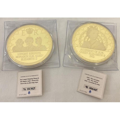 70 - 2 large gold plated 2016 British commemorative medallion coins complete with certificates. No. A0130... 