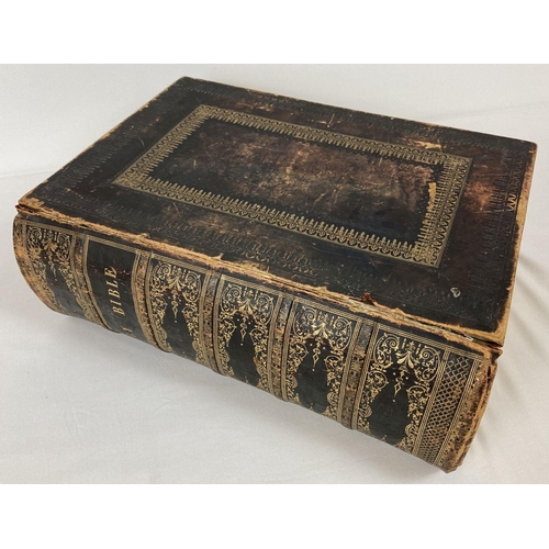 340 - A very large Victorian leather bound The Family Devotional Bible by the Revd Matthew Henry. Dated 18... 