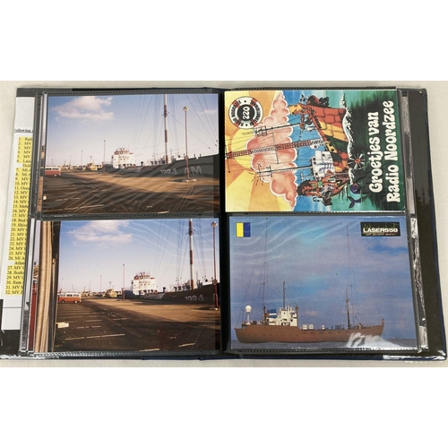 291 - A blue folder containing a collection of photographs and postcards of offshore pirate radio ships. T... 