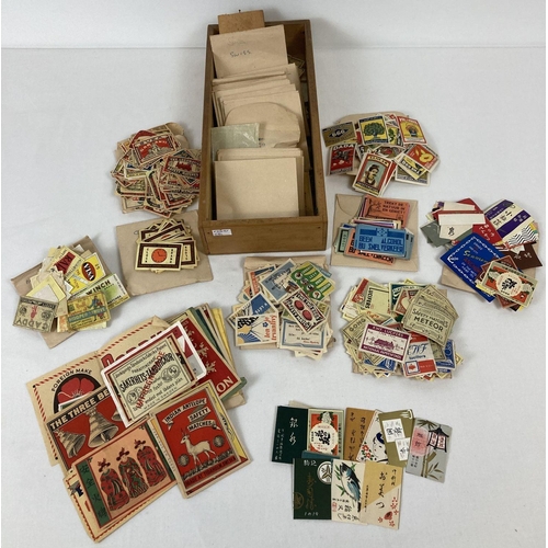 312 - Phillumeny Collection - a quantity of assorted vintage worldwide matchbox labels. Sorted into paper ... 