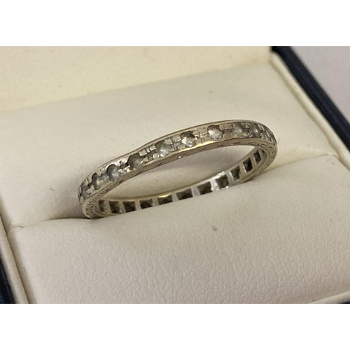 31 - A vintage 14ct white gold full eternity ring set with clear stones. Worn mark to edge of ring. Tests... 