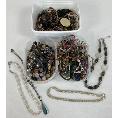 233 - 3 tubs of vintage and modern costume jewellery necklaces in varying styles and conditions.