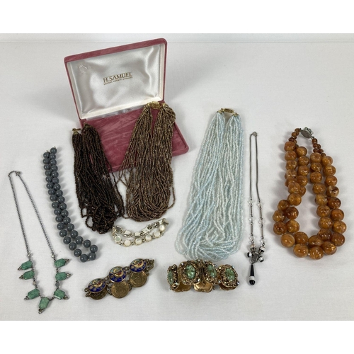 236 - A quantity of assorted vintage glass & plastic beaded necklaces & bracelets.