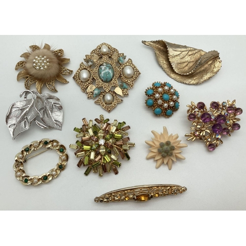 249 - 10 vintage brooches in varying designs and sizes to include stone set. Examples include Sarah Covent... 