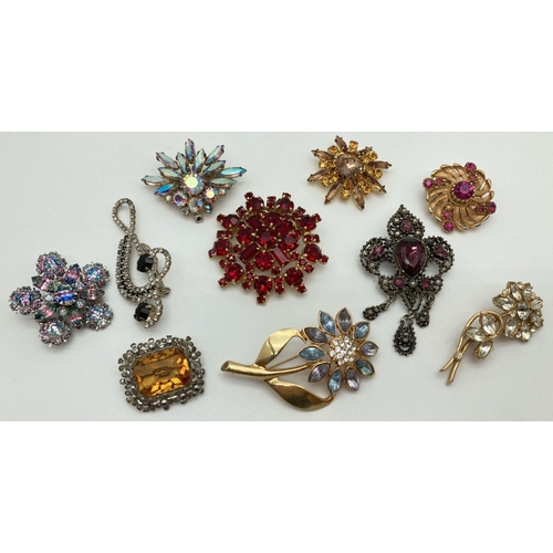 251 - 10 vintage stone set brooches in varying sizes. To include floral and sunray designs. Largest approx... 