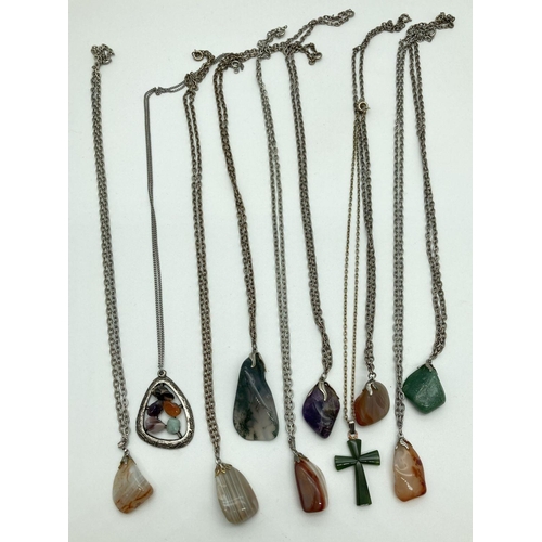 252 - A collection of 14 assorted vintage natural stone pendant necklaces. To include amethyst, moss agate... 