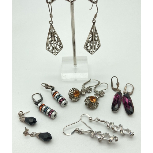 68 - 6 pairs of silver and white metal drop style earrings, mostly stone set. To include floral design pi... 