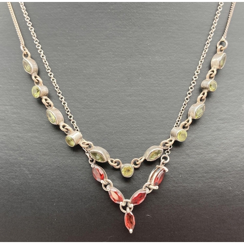 75 - 2 silver stone set necklaces. One set with 6 marquise cut and 5 round cut peridot stones. The other ... 