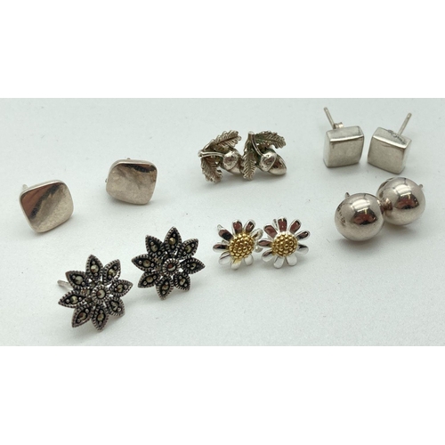 88 - 6 pairs of silver stud style earrings in varying sizes and designs. To include duo coloured daisy st... 