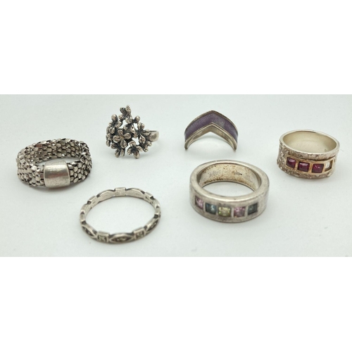 97 - 6 silver dress rings in varying styles and sizes. To include band ring set with multicoloured stones... 