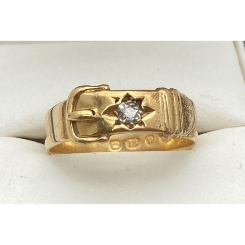 10 - A vintage 18ct gold buckle design ring set with a single round cut 0.07ct diamond. Fully hallmarked ... 