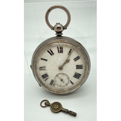 288 - An early 20th century silver cased pocket watch, in working order, complete with key. Enamelled face... 