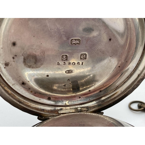 288 - An early 20th century silver cased pocket watch, in working order, complete with key. Enamelled face... 