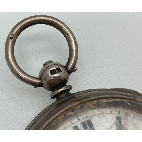 288 - An early 20th century silver cased pocket watch, in working order, complete with key. Enamelled face... 