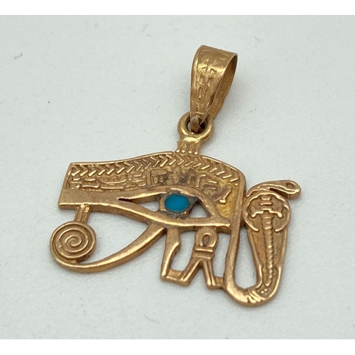 155 - An 18ct gold Egyptian Eye Of Horus pendant with round turquoise stone, serpent detail and decorative... 