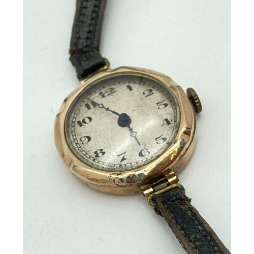 286 - A 1930's 9ct gold cased ladies wristwatch with black leather strap. Hallmarked for Chester, 1933.