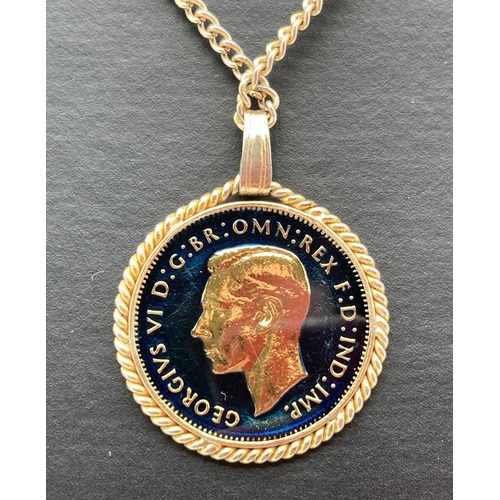 276 - A 1945 farthing that has been coloured and enamelled, set in a gold tone pendant mount on a gold ton... 