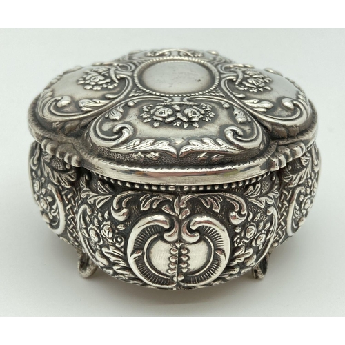 373 - An Armagan 900 decorative four footed silver trinket box with fluted style panels and velvet lining.... 