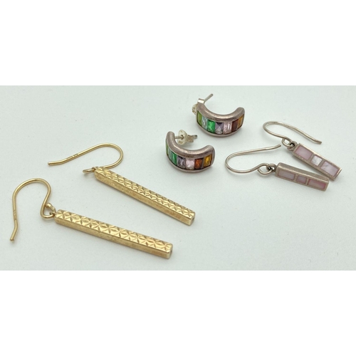 191 - 3 pairs of silver earrings. A pair of half hoops set with multi coloured stones, a pair of silver gi... 