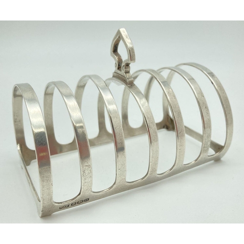 336 - An Art Deco Mappin & Webb silver 6 slice toast rack of curved form, fully hallmarked, Sheffield 1930... 