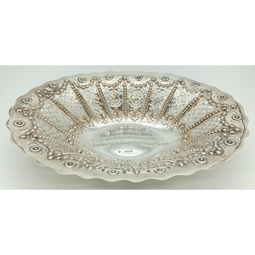 341 - A large Victorian silver decorative bon bon dish with pierced work panel detail. Engraved to inner b... 