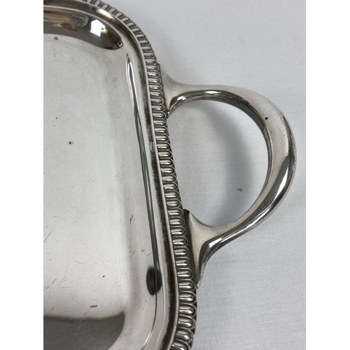 358 - An early 20th century Atkin Brothers silver plated rectangular shaped 2 handled serving tray. Engrav... 