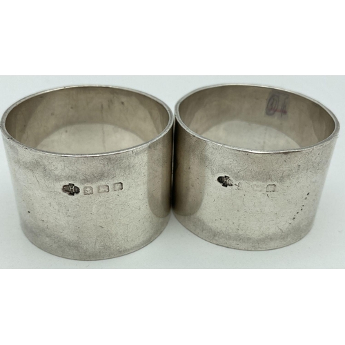 362 - A pair of heavy silver napkin rings, engraved with Home & Henderson Clan crests. Fully hallmarked Bi... 