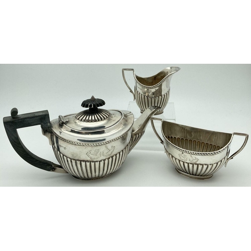 366 - A Victorian silver James Deakin & Sons 3 piece bachelor tea set of classical design. Each piece engr... 