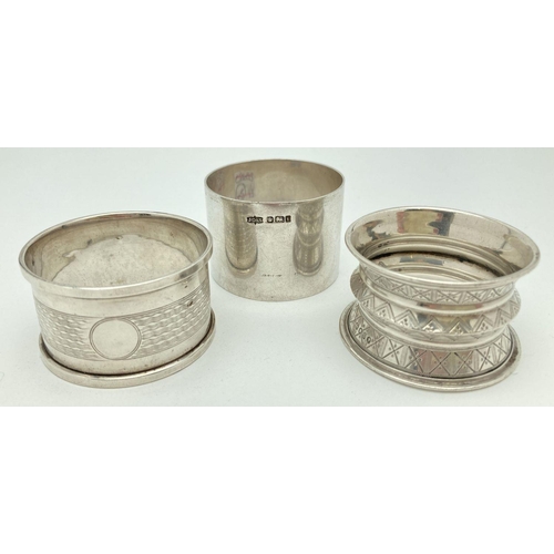 370 - 3 Victorian & vintage silver napkin rings totaling approx. 58.6g. Comprising: William Hutton & Sons ... 