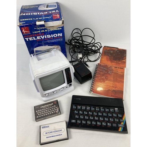 2 - A vintage 1980's Sinclair ZX Spectrum 16K with programming books, adapter and Beyond Horizons casset... 
