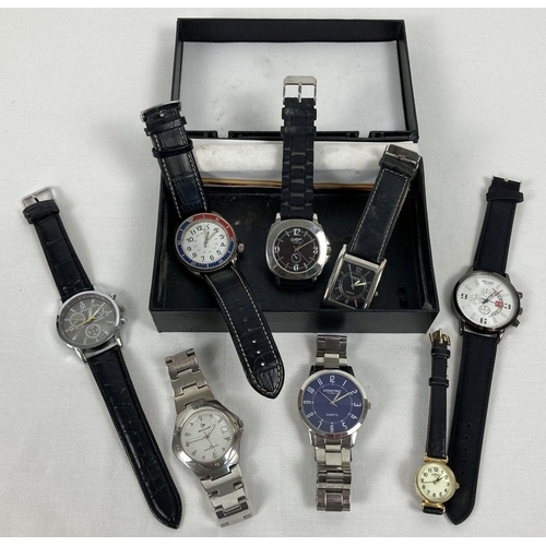 1046 - A box containing 8 men's and ladies wristwatches with both stainless steel and leather straps. Mostl... 