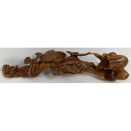 1210 - A highly carved wooden Chinese Ruyi sceptre with floral and bat detail. Approx. 38cm long x 9cm tall... 