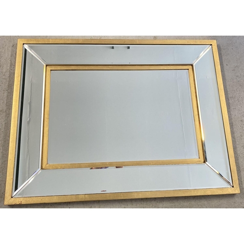 1364 - A large heavy, modern gilt framed sectional mirror with bevel edged glass panels. Approx. 85cm x 110... 