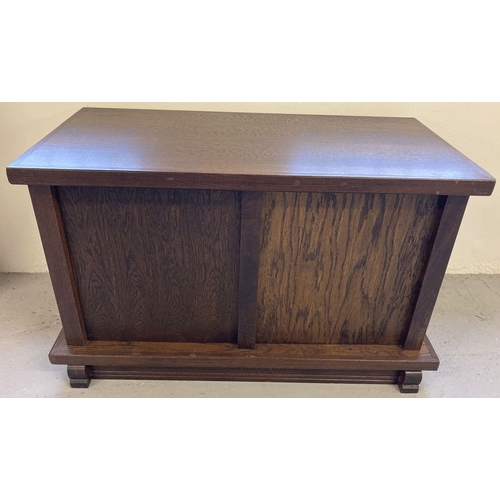 1369 - A heavy oak veneer panelled storage chest/box with front shaped feet and interior lid support chains... 