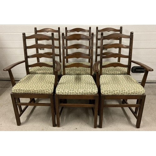 1383 - A set of 6 Ercol ladderback dining chairs, to include 2 carvers. All with matching green leaf seat p... 