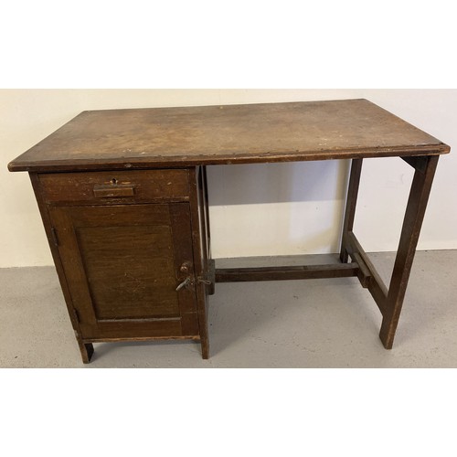 1393 - A vintage 1940's dark oak framed Utility desk with single drawer and cupboard. Approx. 70cm tall x 1... 