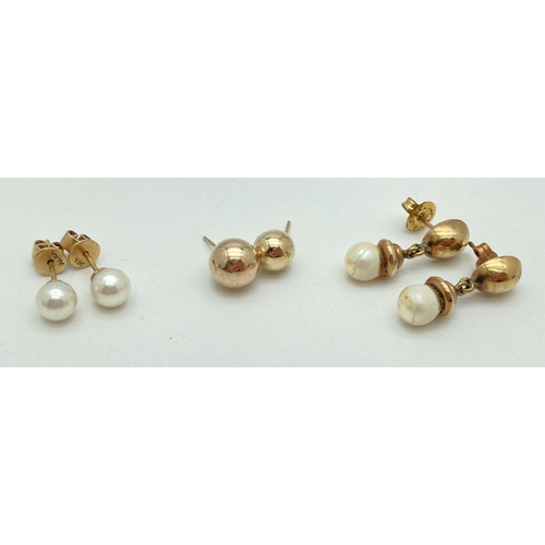 44 - A pair of pearl stud earrings together with a pair of pearl drop style earrings and two single gold ... 