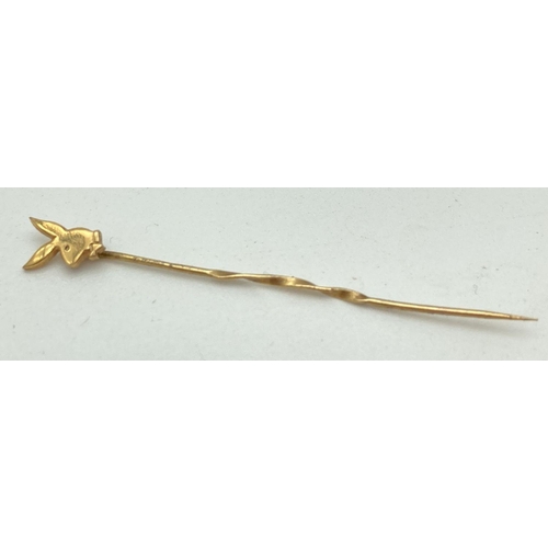 53 - A 9ct gold Playboy Bunny stick pin. Hallmarks to side of pin. Total weight approx. 0.4g.