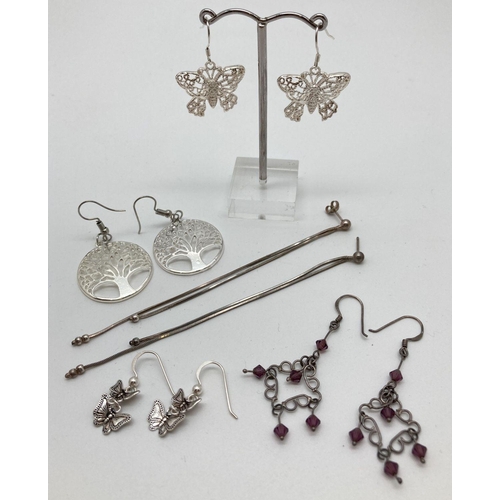 99 - 5 pairs of vintage and modern drop style earrings, to include silver. Designs include: butterfly dro... 