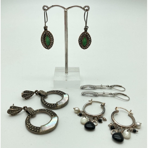 102 - 4 pairs of decorative stone set drop and hoop style earrings. A pair of circular drops set with moth... 