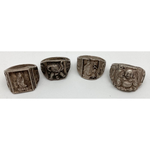 343 - 4 Chinese white metal signet style rings in varying sizes. Depicting Buddha, Chinese characters and ... 