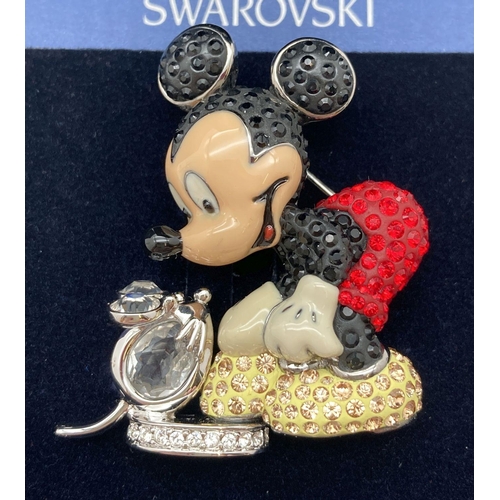 278 - A boxed Swarovski 2005 Disney Mickey Mouse brooch. Featuring a fully stone set mickey with enamelled...