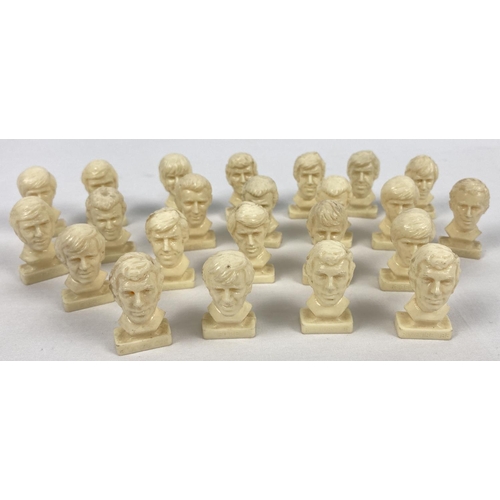 1285 - A collection of early 1970's Joe Mercers Football squad bust collectable figurines from Cleveland Pe... 