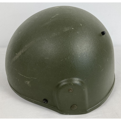 1114 - A British general service Mk6 ballistic nylon helmet, circa 1990. Complete with liner and 3-point ha... 