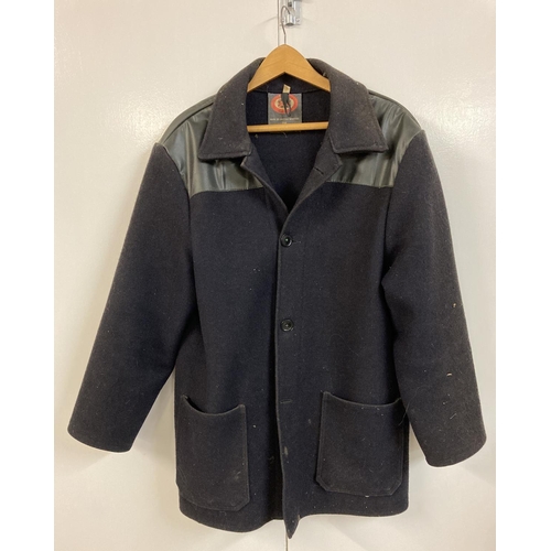 1257 - A vintage dark blue wool Donkey Jacket with vinyl shoulder panel by Dudes. Button fastening with two... 