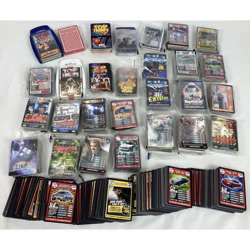 1250 - A box of assorted trading cards and card games to include Top Trumps. Box includes a large collectio... 