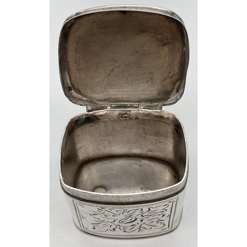 1057 - A Victorian Dutch silver peppermint box with engraved panelled design. Hinge lidded box with floral ... 