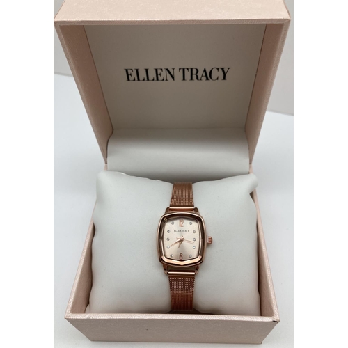 1016 - A ladies brand new boxed wristwatch by Ellen Tracy. Rose gold tone square shaped case with rose gold... 