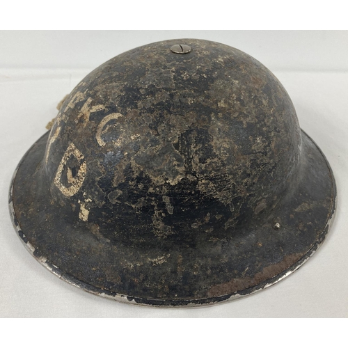 1117 - A British WWII Mk II steel Civil Defence Home Front helmet, painted black. Labelled EKCO for the EKC... 