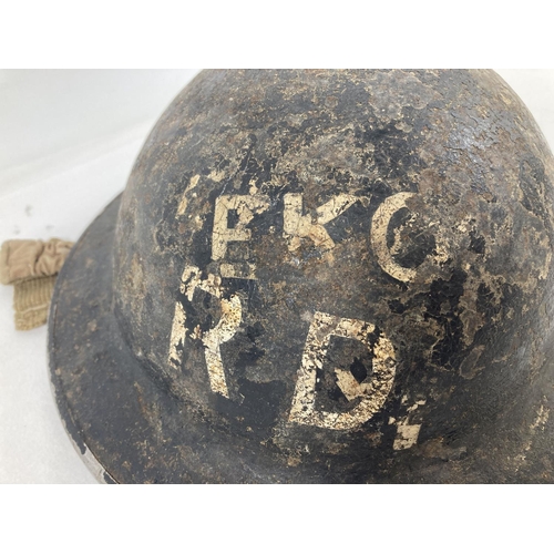 1117 - A British WWII Mk II steel Civil Defence Home Front helmet, painted black. Labelled EKCO for the EKC... 